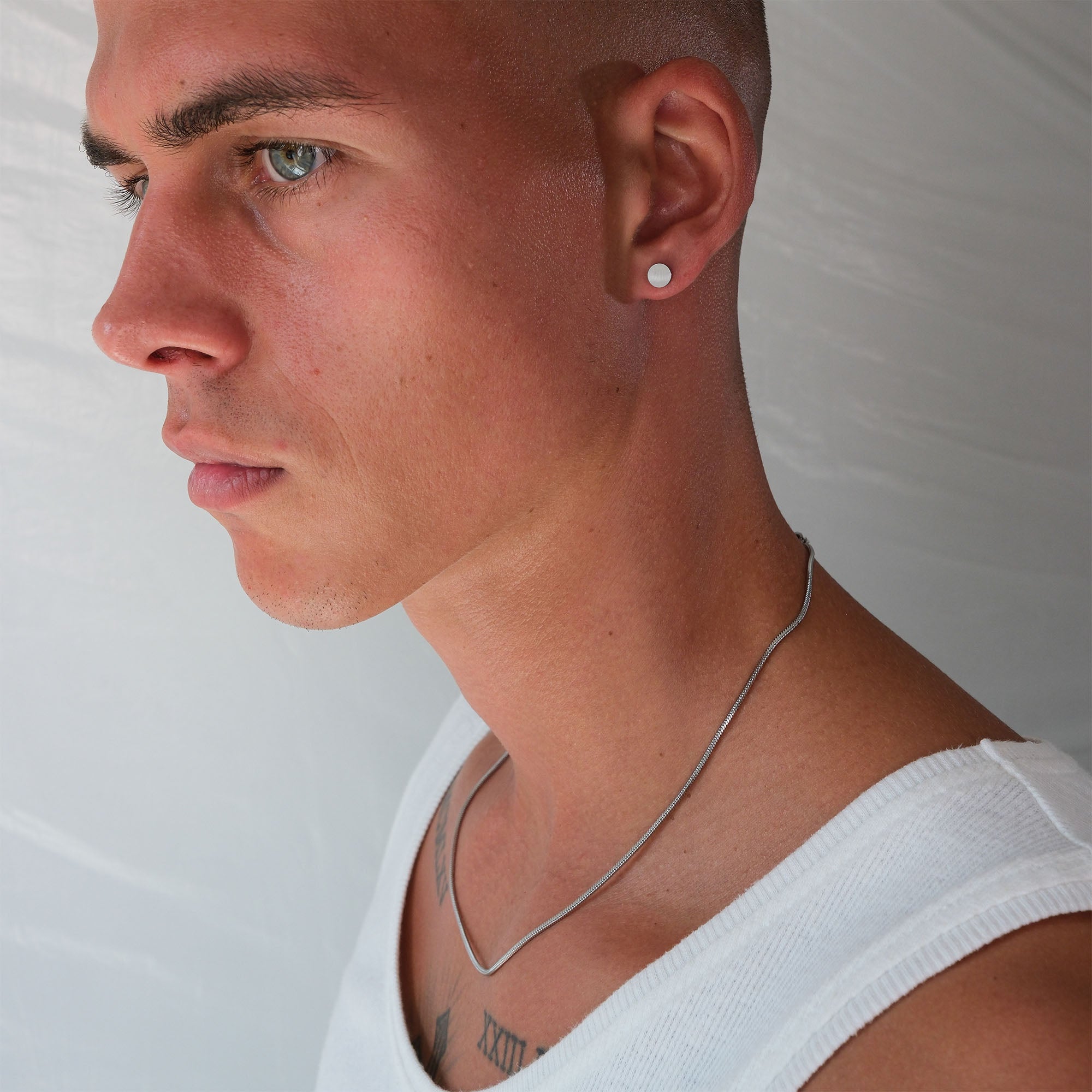 K12 - SILVER STEEL STUD EARRING